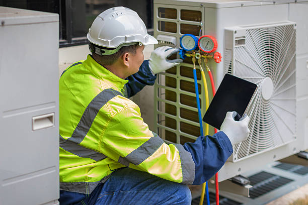 Professional Hvac technician working in Raymore, MO